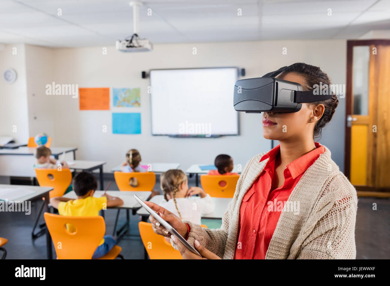 Teacher using 3D glasses Stock Photo - Alamy