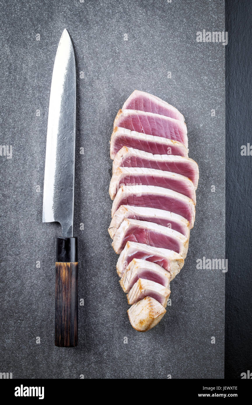 Long tuna cutting knife tsukiji hi-res stock photography and images - Alamy