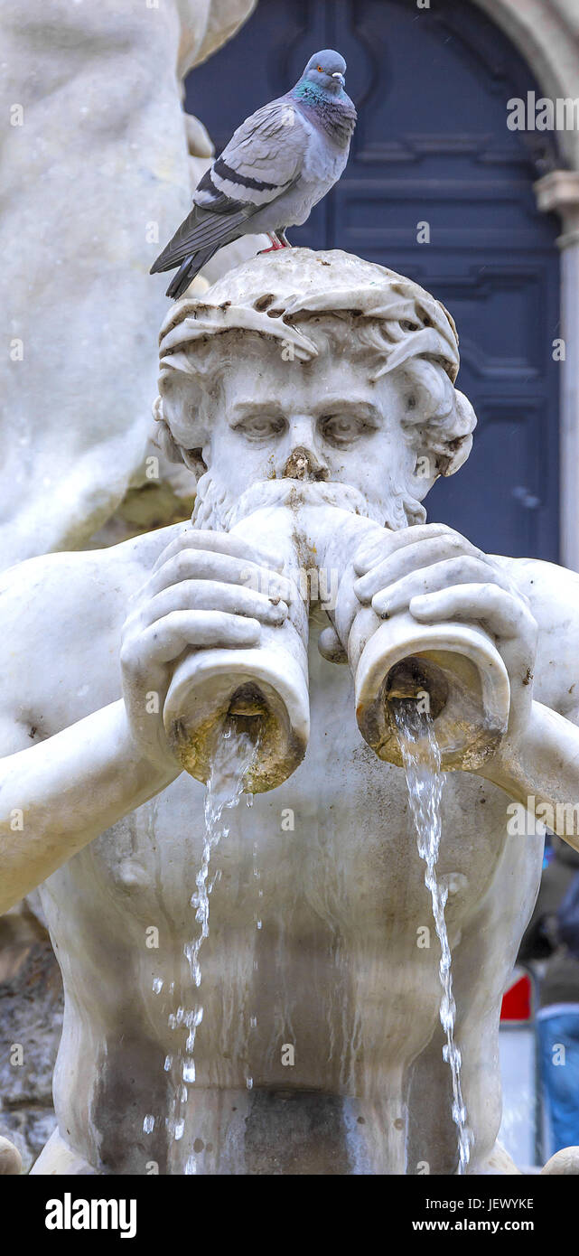 triton statue with pigeon Stock Photo Alamy