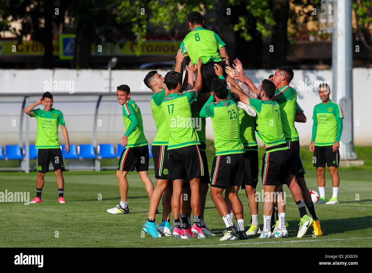 Mexican players lift teammate Marco Fabian into the air during warm-up at the Mexican national team's training during the Confederations Cup in Sochi, Russia, 27 June 2017. Photo: Christian Charisius/dpa Stock Photo