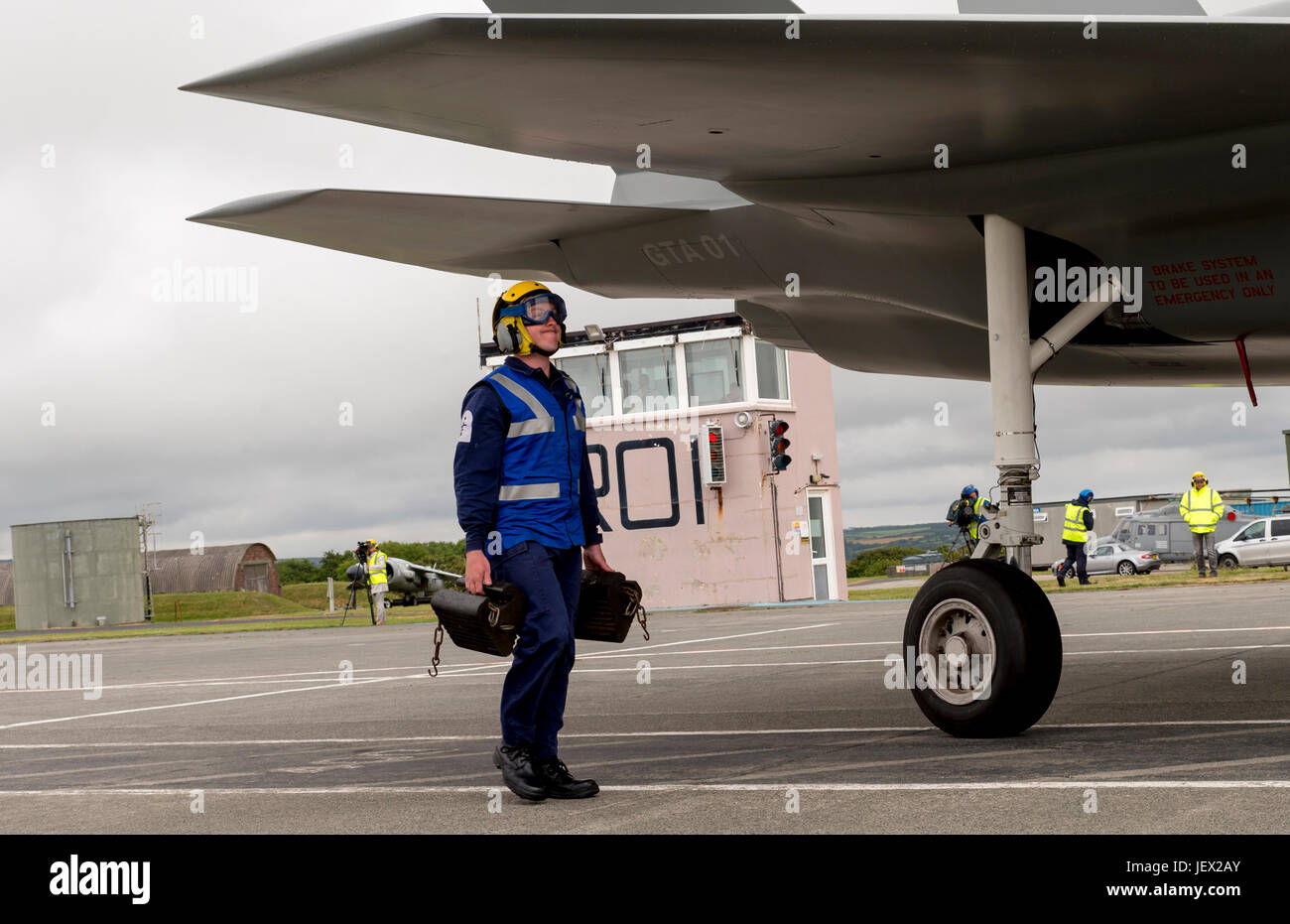 Official Media Assignment at RNAS Culdrose, Helston, Cornwall, UK. 27th June, 2017. An aircraft Handler under the wing of a life size F35B Lightning II Jet gaining experience for working on HMS Queen Elizabeth Credit: Bob Sharples/Alamy Live News Stock Photo