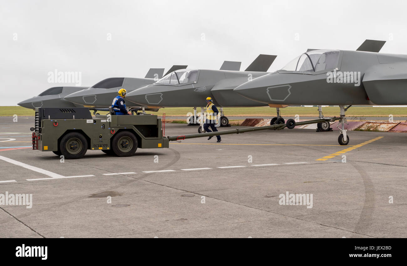 Official Media Assignment at RNAS Culdrose, Helston, Cornwall, UK. 27th June, 2017. Aircraft Handlers manouvre the F35B Jet replicas, as they would on HMS Queen Elizabeth Credit: Bob Sharples/Alamy Live News Stock Photo