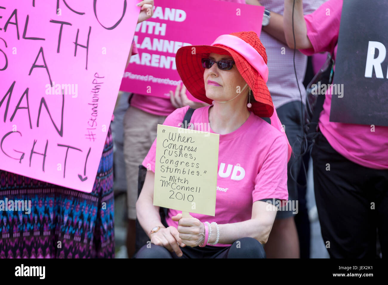 Washington, DC, USA. 27th June, 2017. Planned Parenthood supporters protest in front of the US Capitol building. Stock Photo