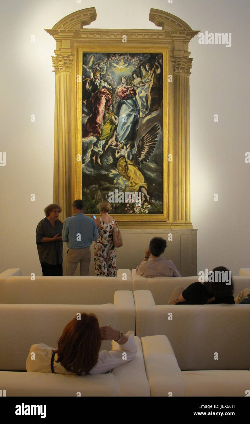 Visitors take a look at the work 'Immaculate Conception' by Spanish