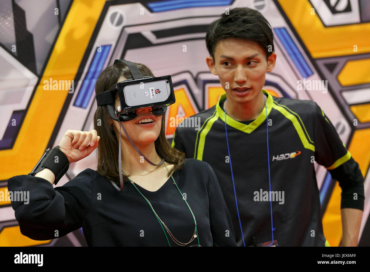 Tokyo, Japan. 28th June, 2017. A woman tests a virtual reality glasses during the CONTENT TOKYO 2017 at Tokyo Big Sight on June 28, 2017, Tokyo, Japan. New technologies such as Artificial Intelligence (AI), Virtual Reality (VR) and Augmented Reality (AR) are introduced during the three-day trade show where 1760 exhibitors from the entertainment content industry will attend. Organizers expect that the event will draw some 63,000 visitors. Credit: Rodrigo Reyes Marin/AFLO/Alamy Live News Stock Photo
