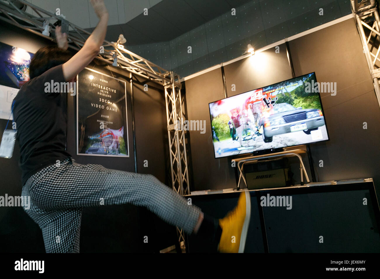 Tokyo, Japan. 28th June, 2017. A man tests a video game during the CONTENT TOKYO 2017 at Tokyo Big Sight on June 28, 2017, Tokyo, Japan. New technologies such as Artificial Intelligence (AI), Virtual Reality (VR) and Augmented Reality (AR) are introduced during the three-day trade show where 1760 exhibitors from the entertainment content industry will attend. Organizers expect that the event will draw some 63,000 visitors. Credit: Rodrigo Reyes Marin/AFLO/Alamy Live News Stock Photo