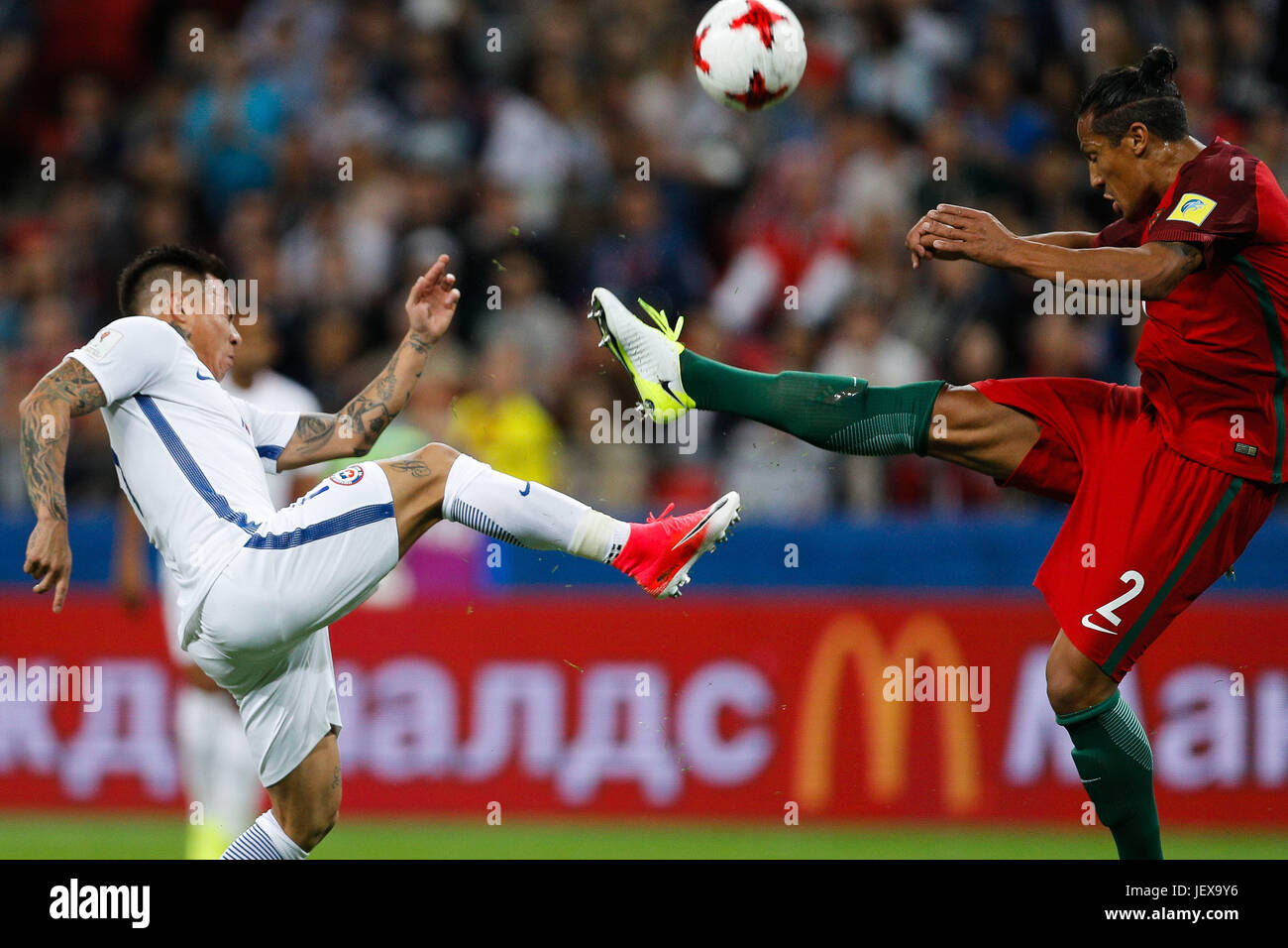 KAZAN, RT - 28.06.2017: PORTUGAL VS CHILE - VARGAS Eduardo of Chile plays the ball with BRUNO ALVES of Portugal during a match between Portugal and Chile, valid for the semifinals of the 2017 Confederations Cup, on Wednesday (28th), held at the Kazan Arena in Kazan, Russia. (Photo: Marcelo Machado de Melo/Fotoarena) Stock Photo