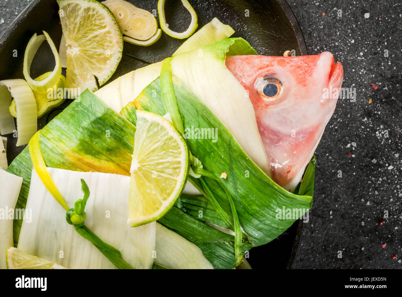 Leek Wrapped Fish. seafood. Asian and Eastern cuisine. Red tilapia wrapped in leek ...