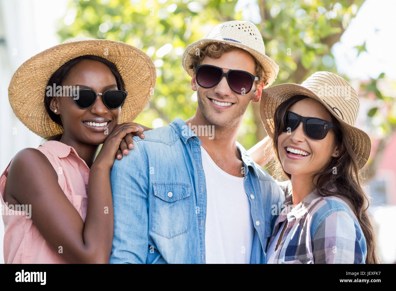 Friends posing at camera Stock Photo - Alamy