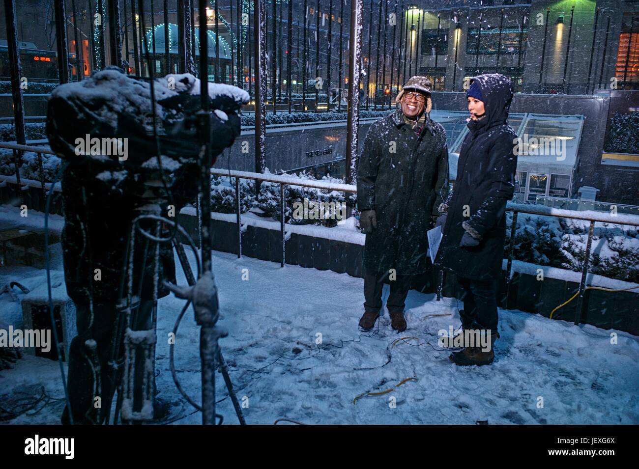 A news crew at Rockefeller Plaza during winter storm Juno. Stock Photo