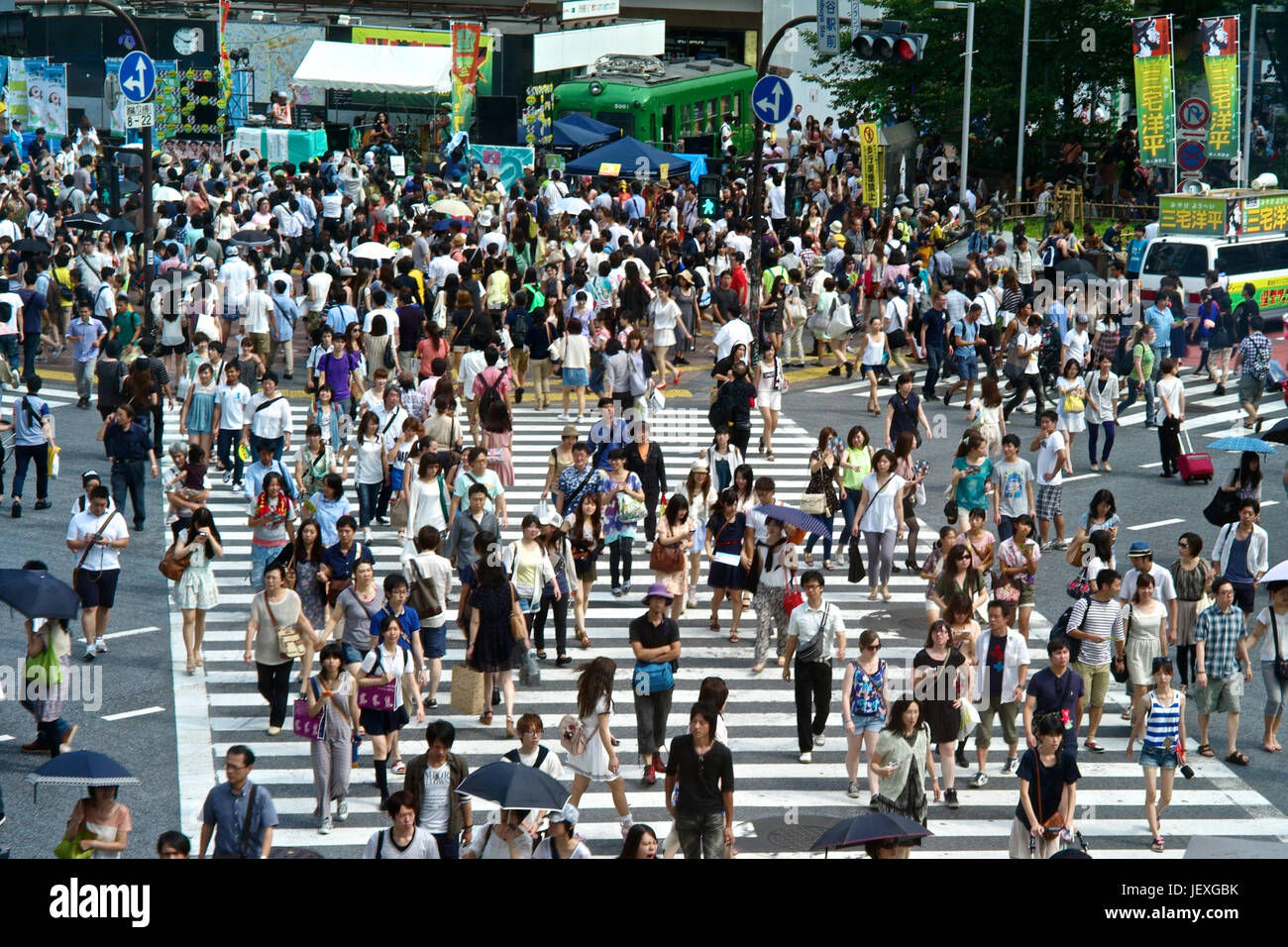 Pedestrians on the move in the Shinjuku District of Tokyo. Stock Photo