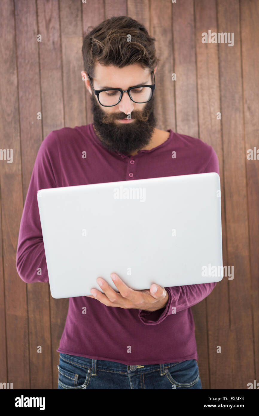 Hipster man using a computer Stock Photo - Alamy