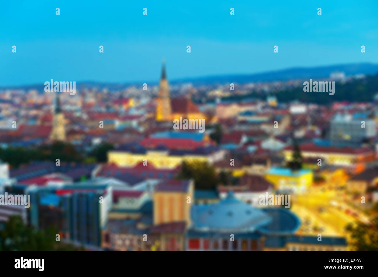 Skyline of Cluj-Napoka - capital of Transylvania. Romania. Lens blur Stock Photo