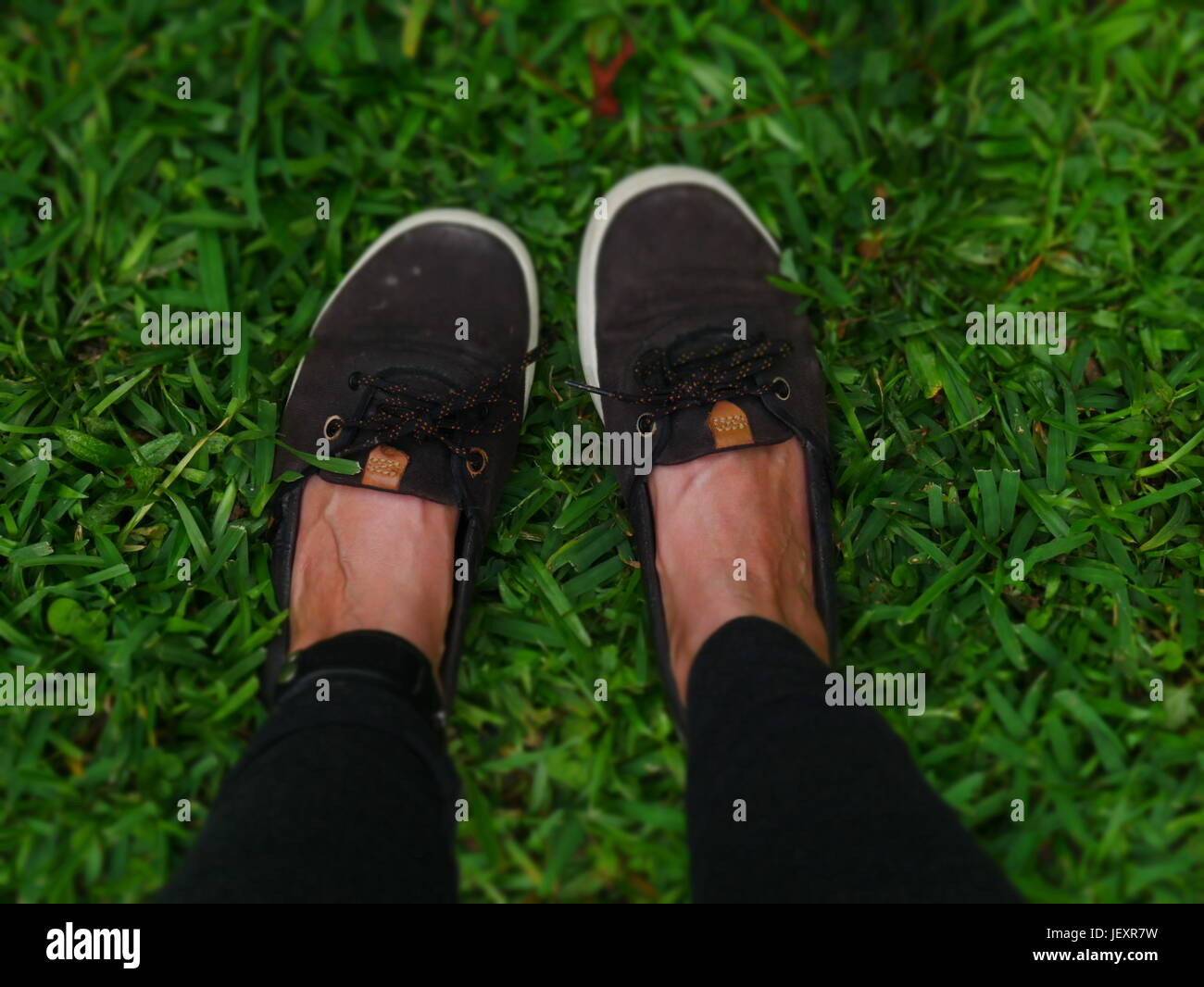 Shoes in the grass Stock Photo Alamy