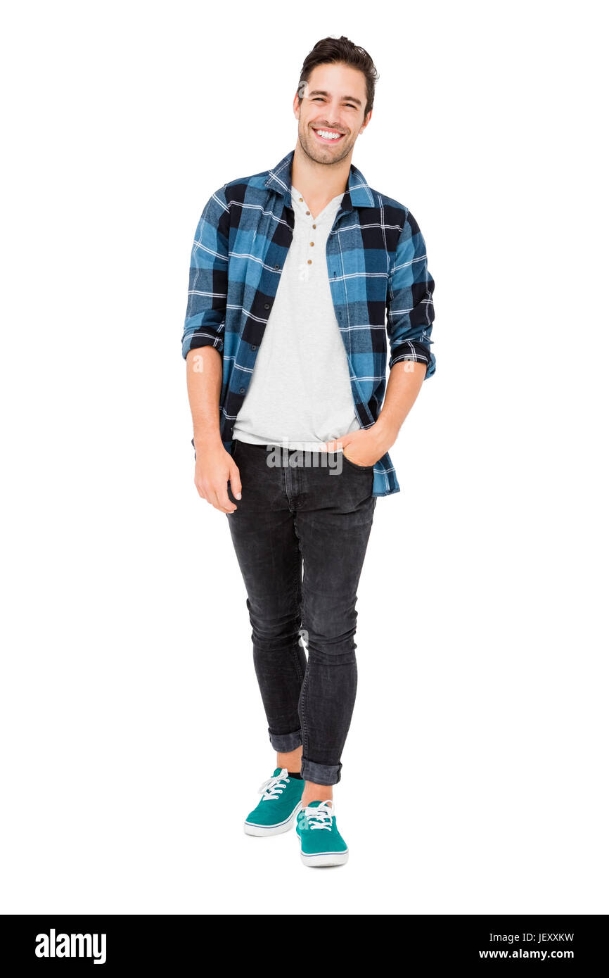 Happy young man smiling at camera Stock Photo - Alamy