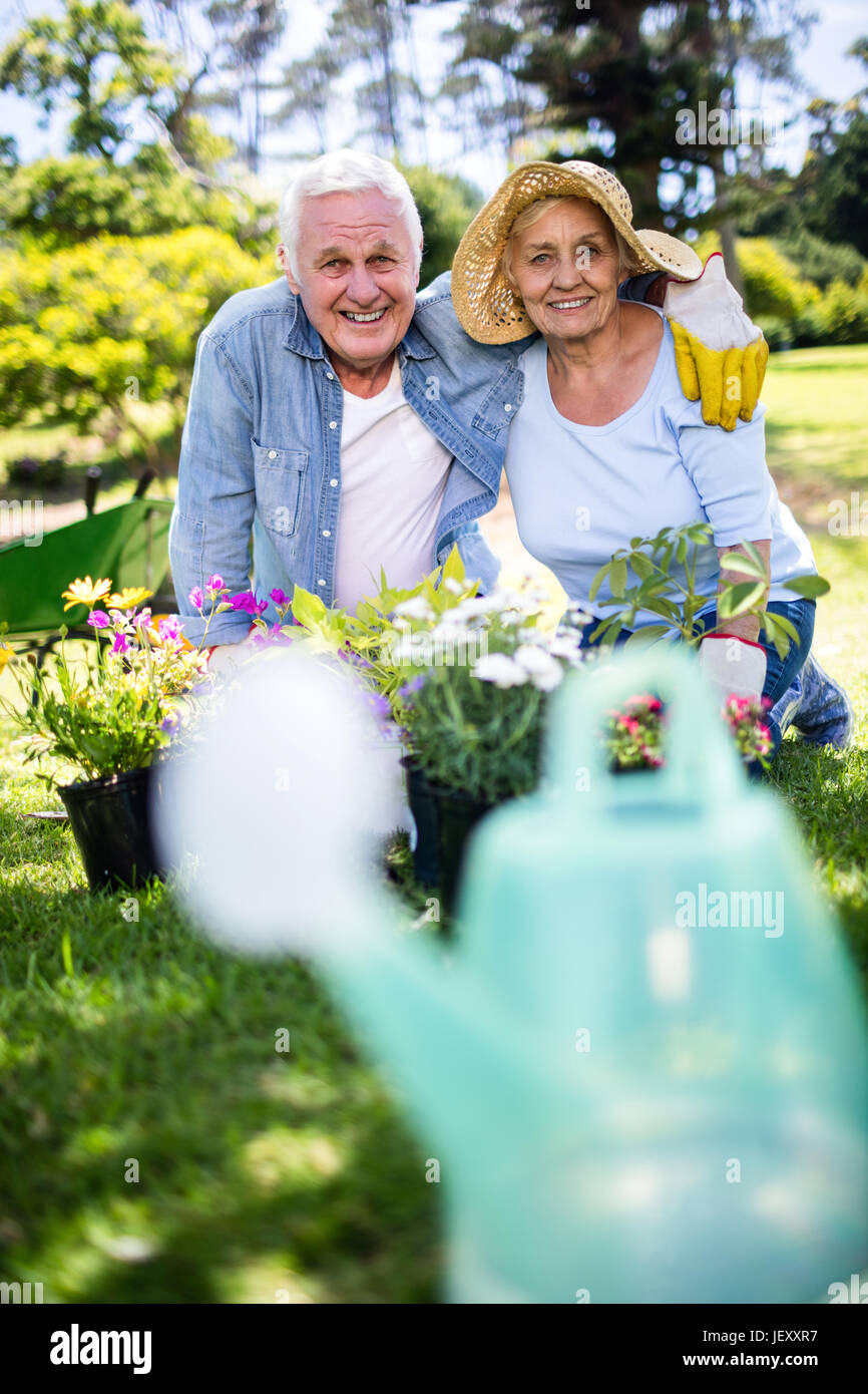 Senior caucasian couple watering plants hi-res stock photography and ...