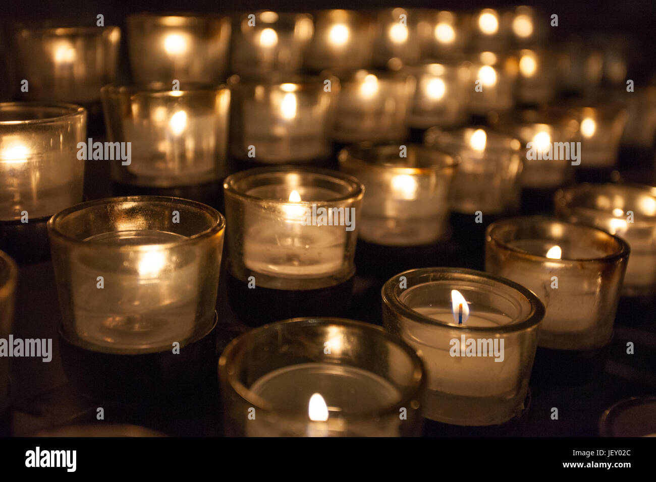 Prayer Candles in a church Stock Photo