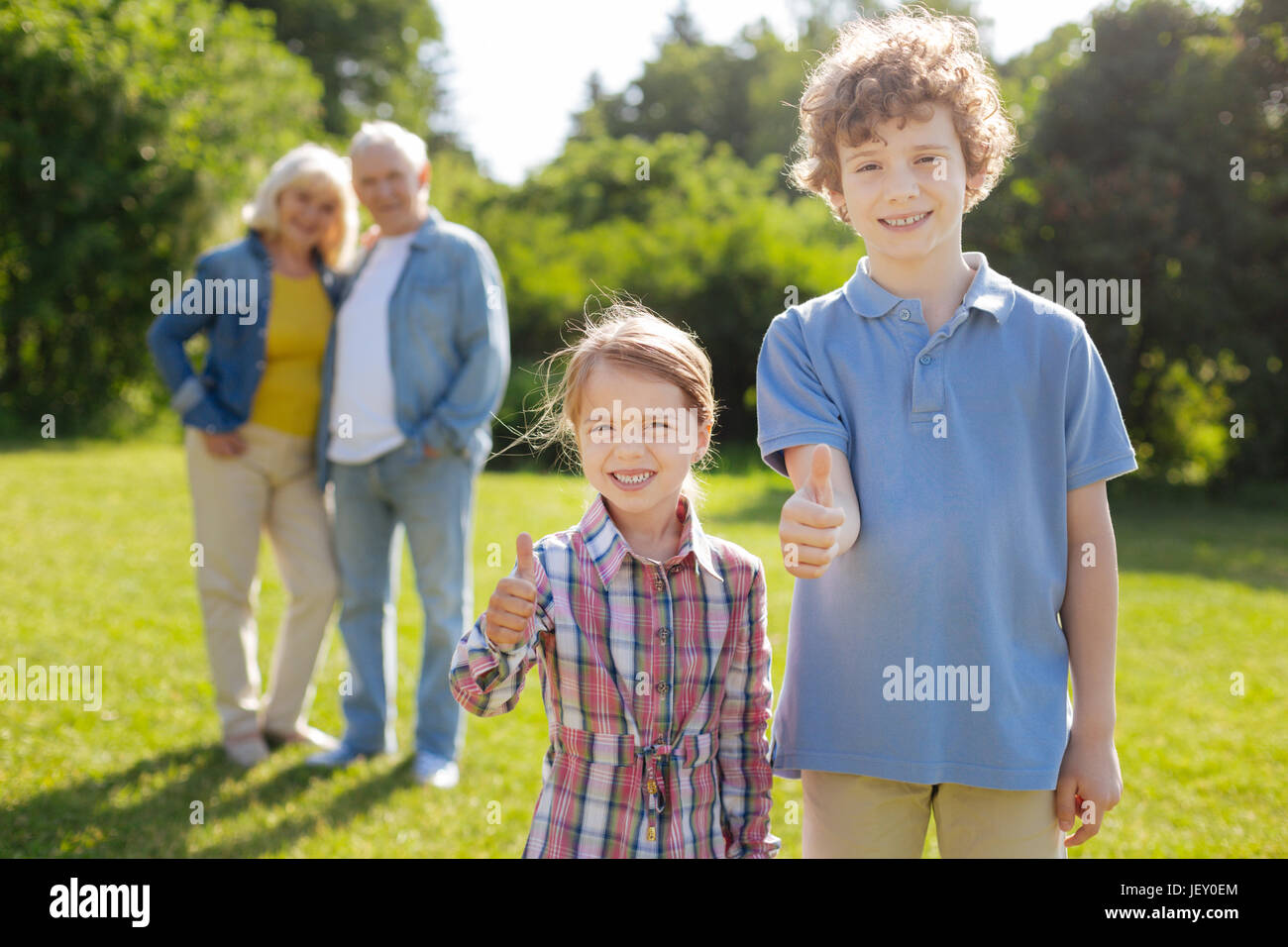 Two children being very friendly Stock Photo