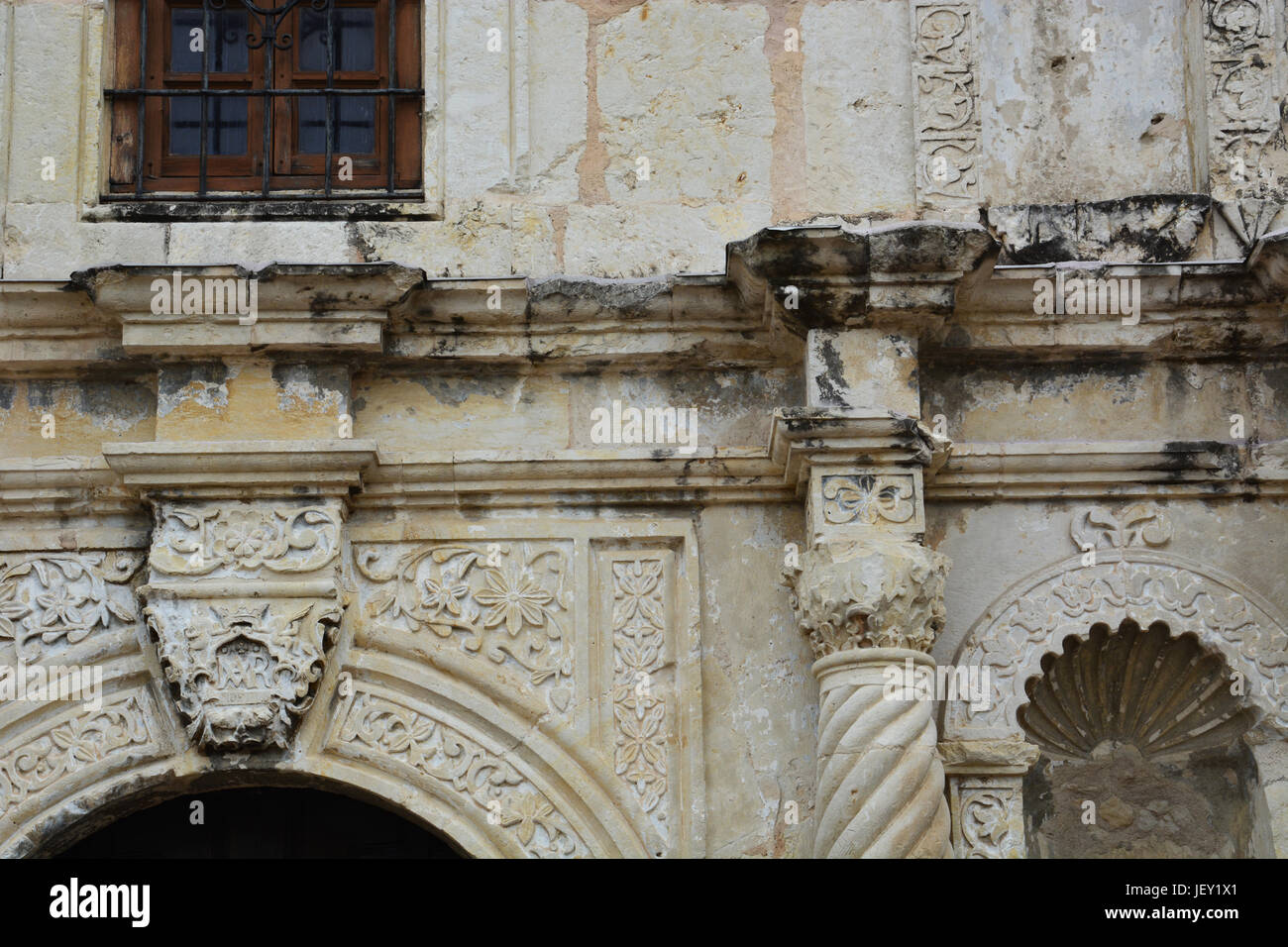 Close up details of the carved stonework at the Alamo in San Antonio Stock Photo