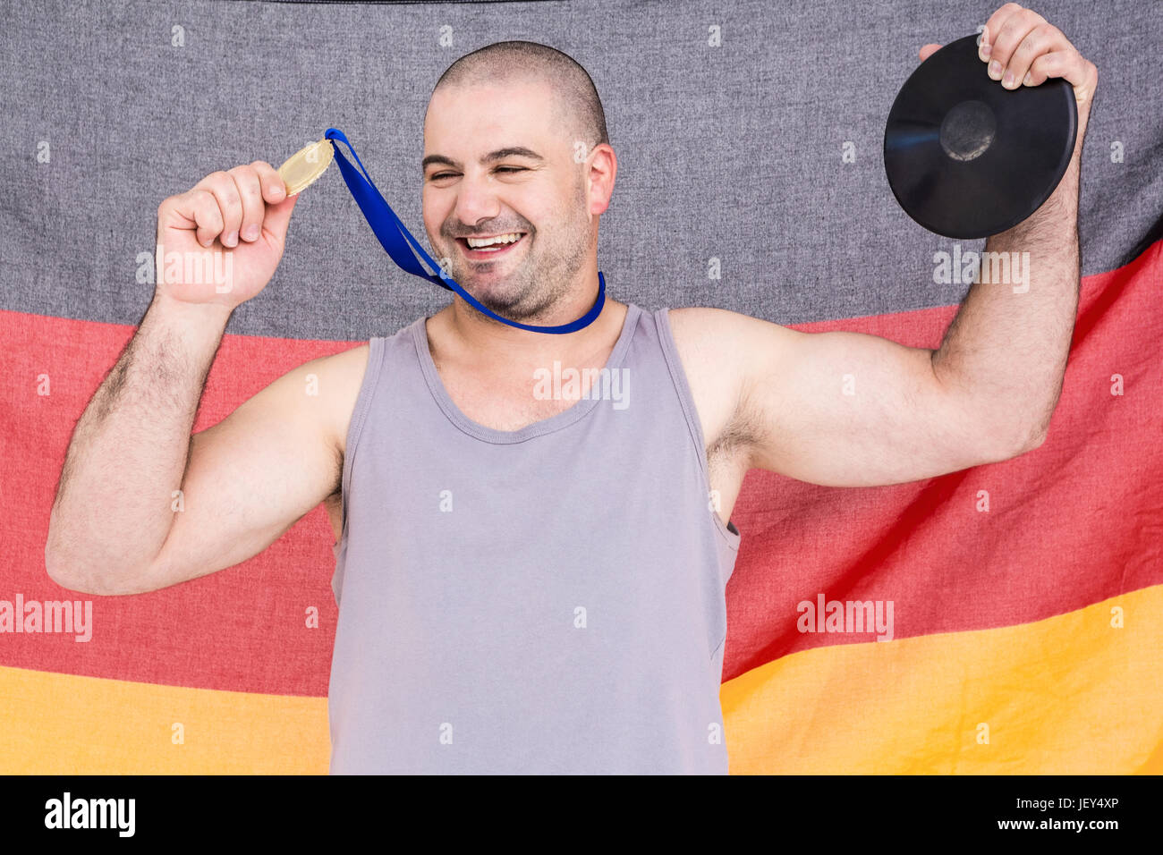 Athlete with olympic gold medal Stock Photo