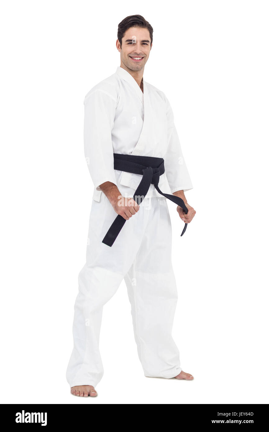 Fighter tightening karate belt Stock Photo Alamy