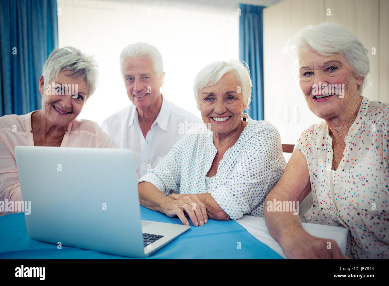 Group of seniors using a computer Stock Photo - Alamy