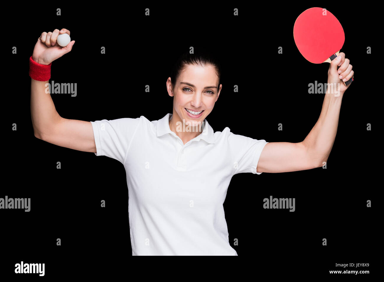 Female athlete playing ping pong Stock Photo