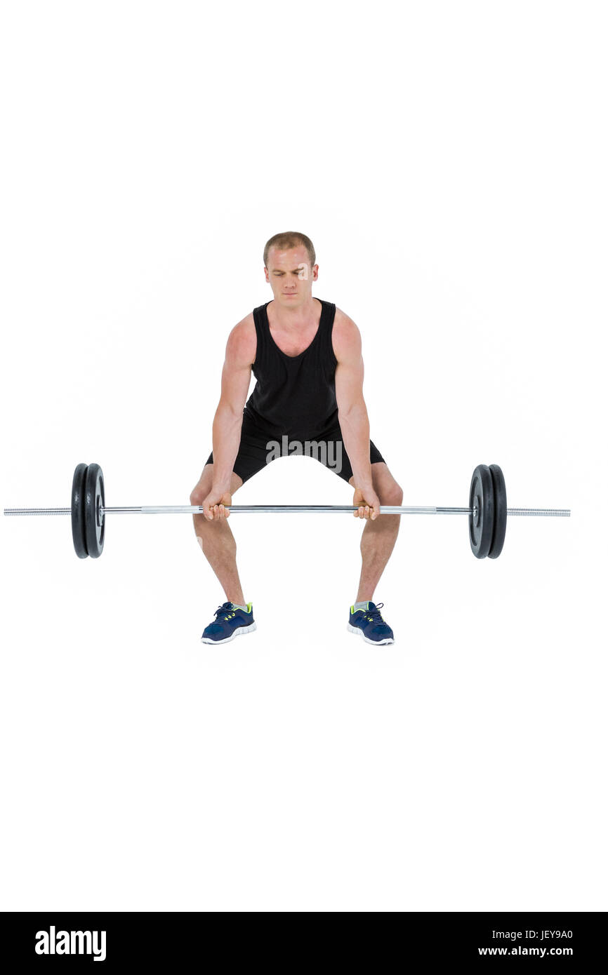 Bodybuilder lifting heavy barbell weights Stock Photo Alamy