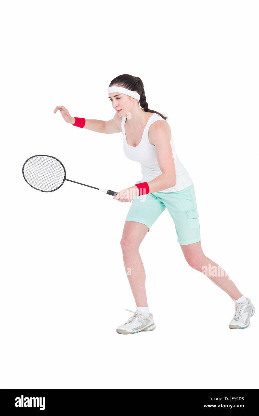 Female athlete playing badminton Stock Photo