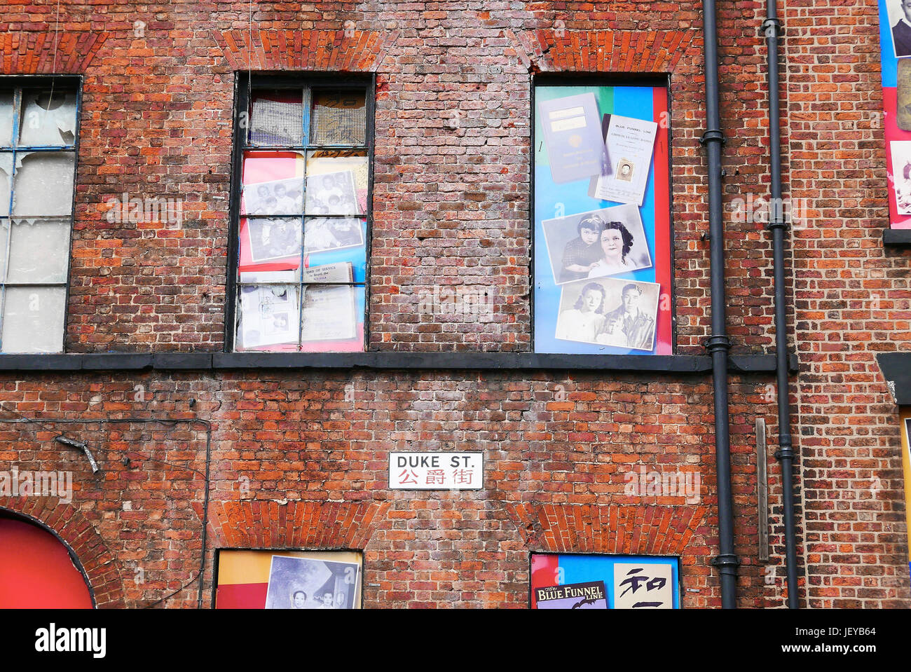 The artwork Opera for Chinatown on the wall and windows of old building on Duke Street,Chinatown,Liverpool,UK Stock Photo