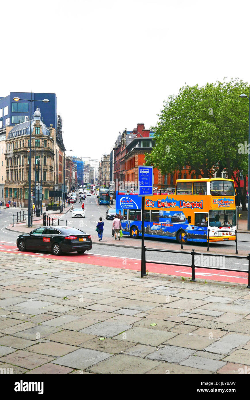 City explorer bus and traffic in Liverpool city centre Stock Photo Alamy