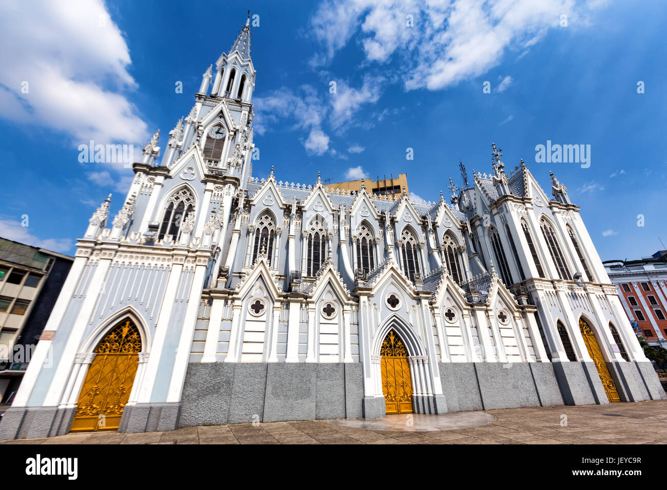 Blue skies over the dramatic Gothic La Ermita Church in Cali, Colombia