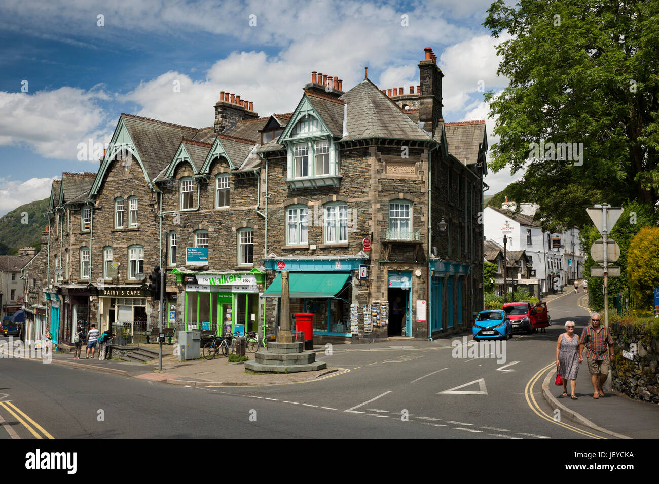 UK, Cumbria, Ambleside, Rydal Road, Post Office and tourism businesses in slate-built Central Buildings Stock Photo