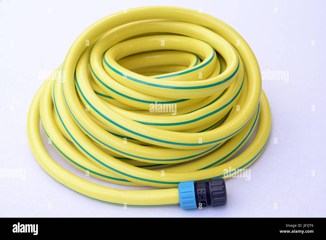 Yellow garden hose hi-res stock photography and images - Alamy