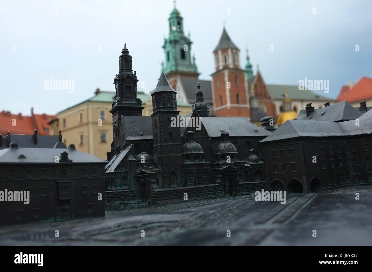 A model of the Wawel Royal Castle in front of the real thing in Old Town, Krakow, Poland, Central/Eastern Europe, June 2017. Stock Photo