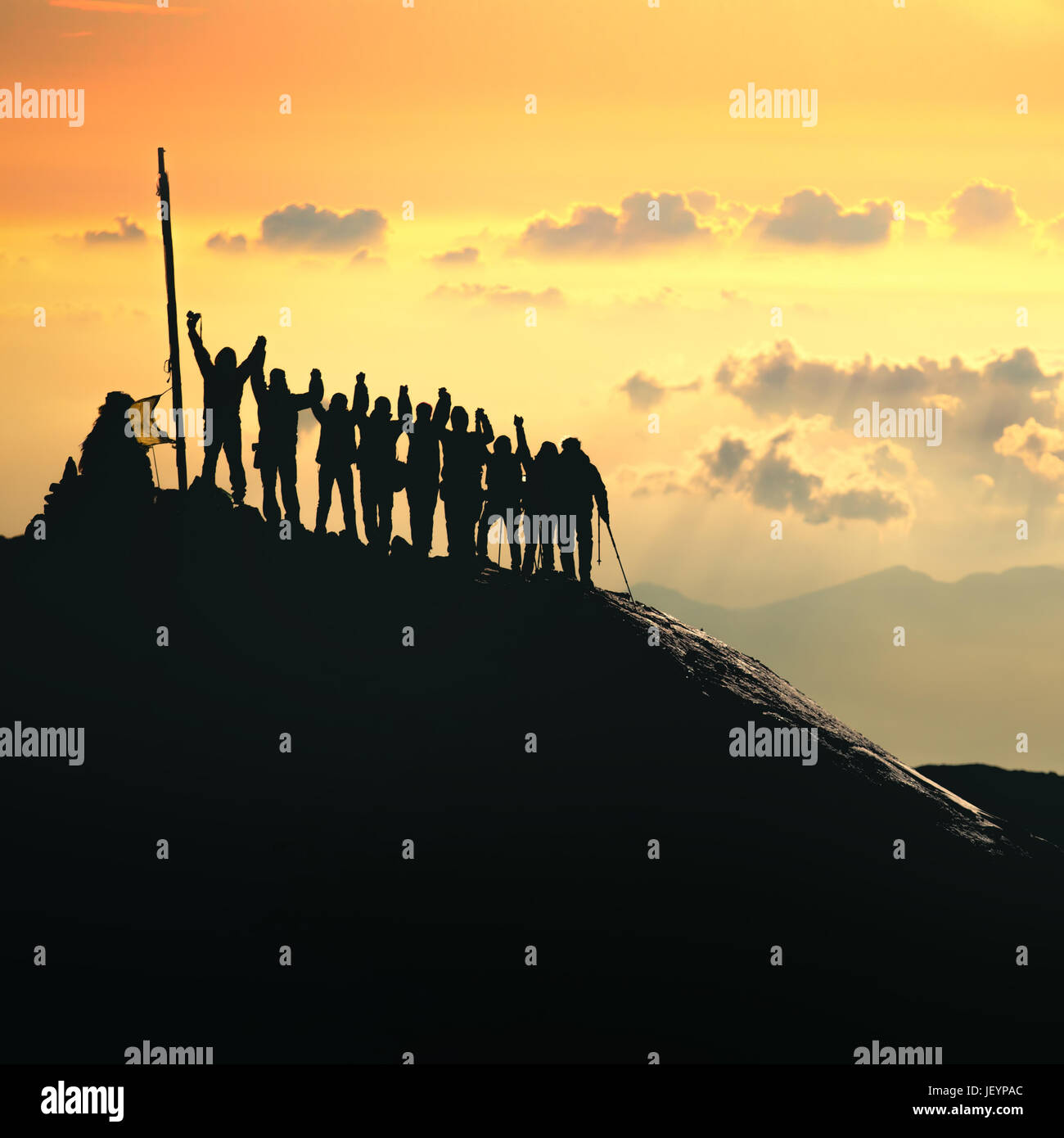 A group of people standing on the top of the hill. Captured in Nepal, Himalayas. Stock Photo