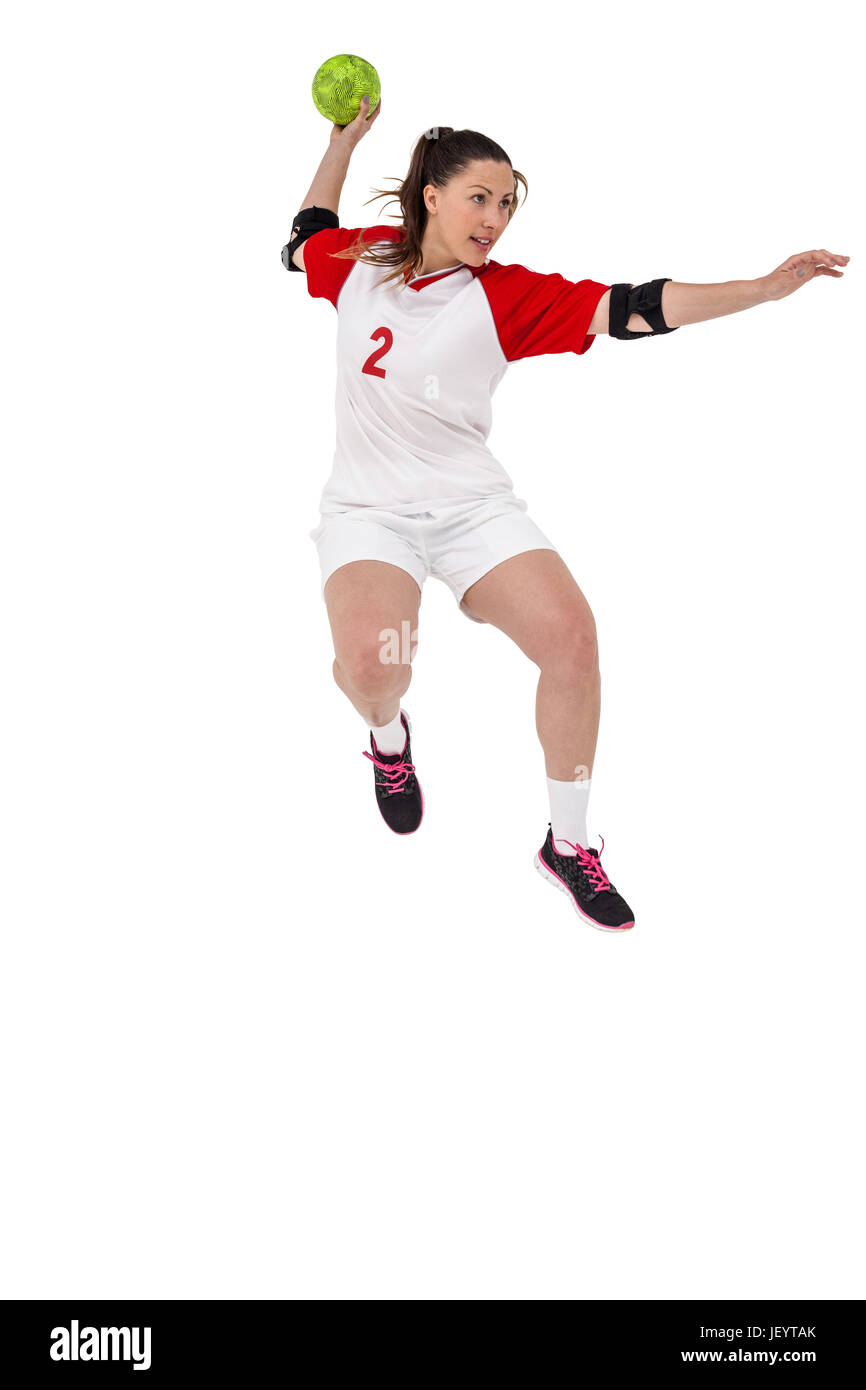 Sportswoman throwing a ball Stock Photo - Alamy