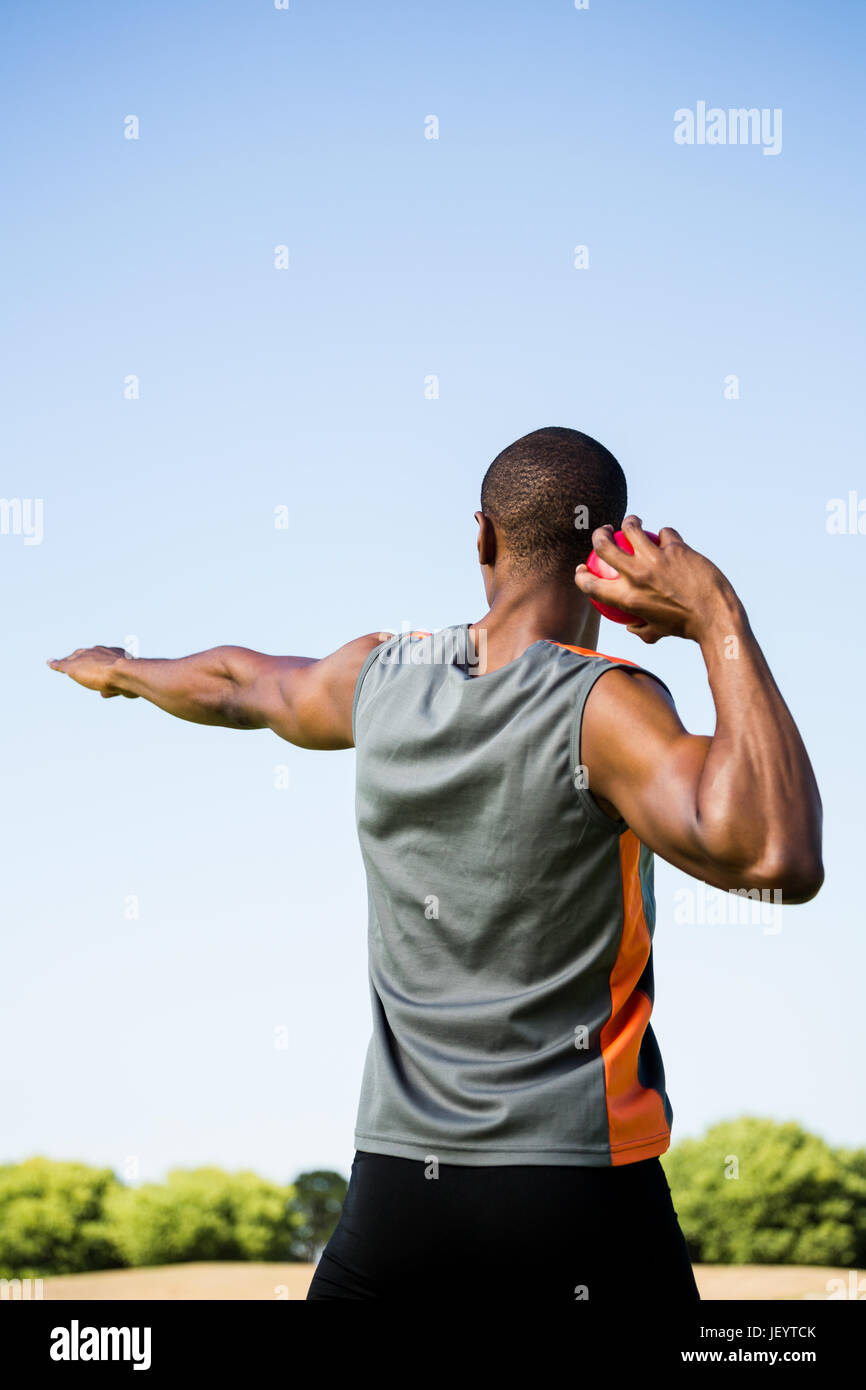 Athlete about to throw shot put ball Stock Photo Alamy