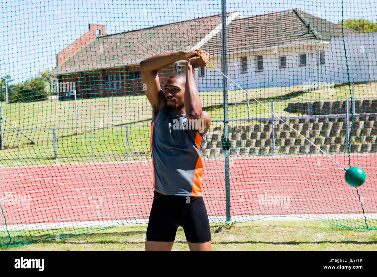 Athlete performing a hammer throw Stock Photo Alamy
