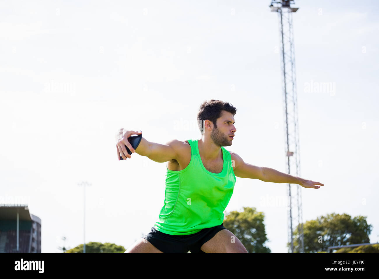 Athlete about to throw a discus Stock Photo Alamy