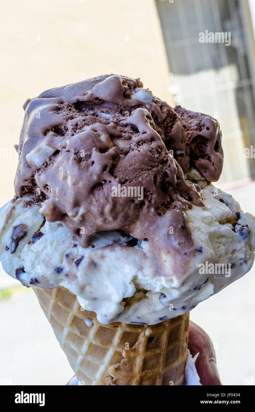 A Rocky Road and Heath bar flavored Ice Cream cone Stock Photo