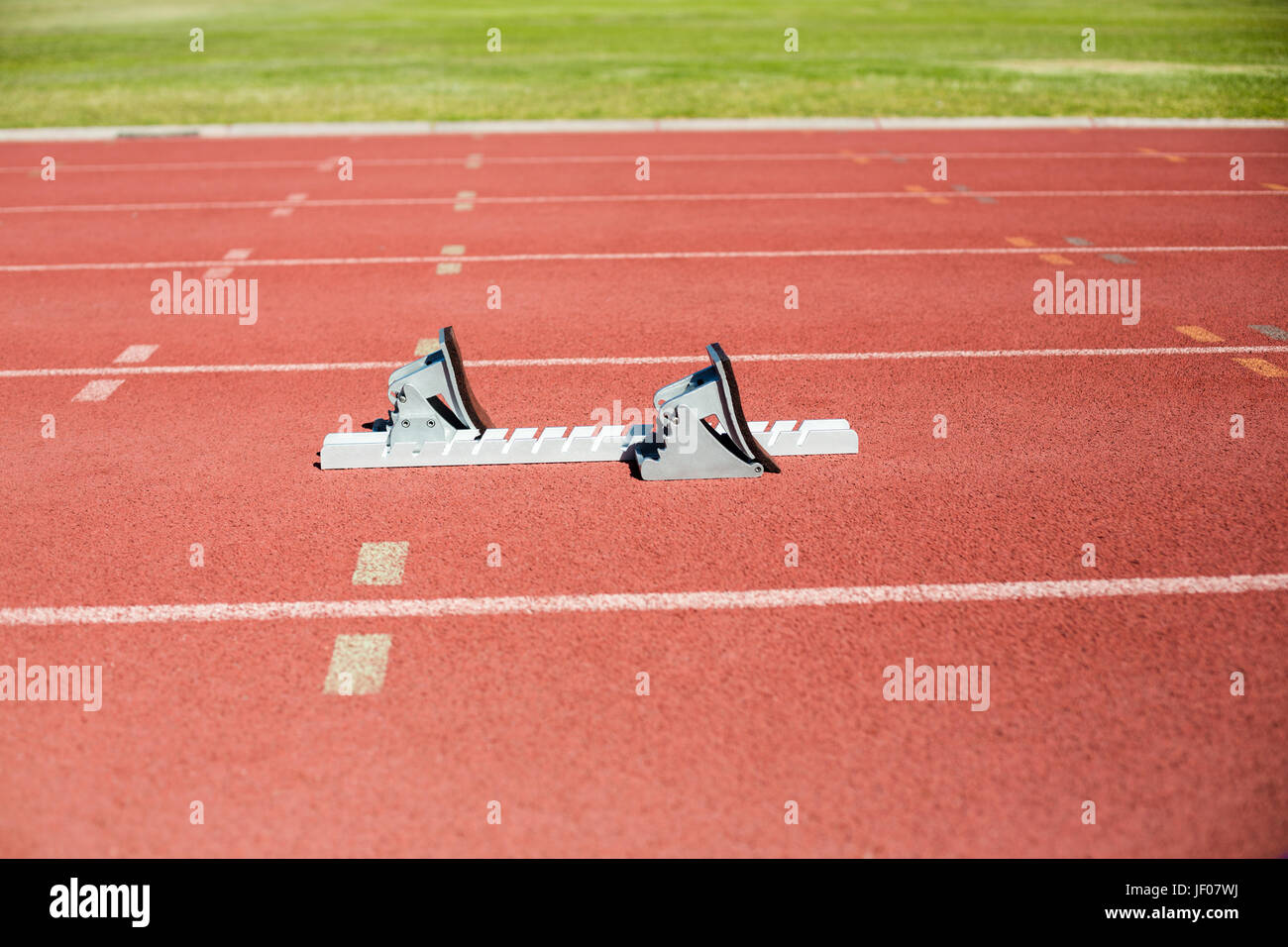 Starting block on a running track Stock Photo Alamy