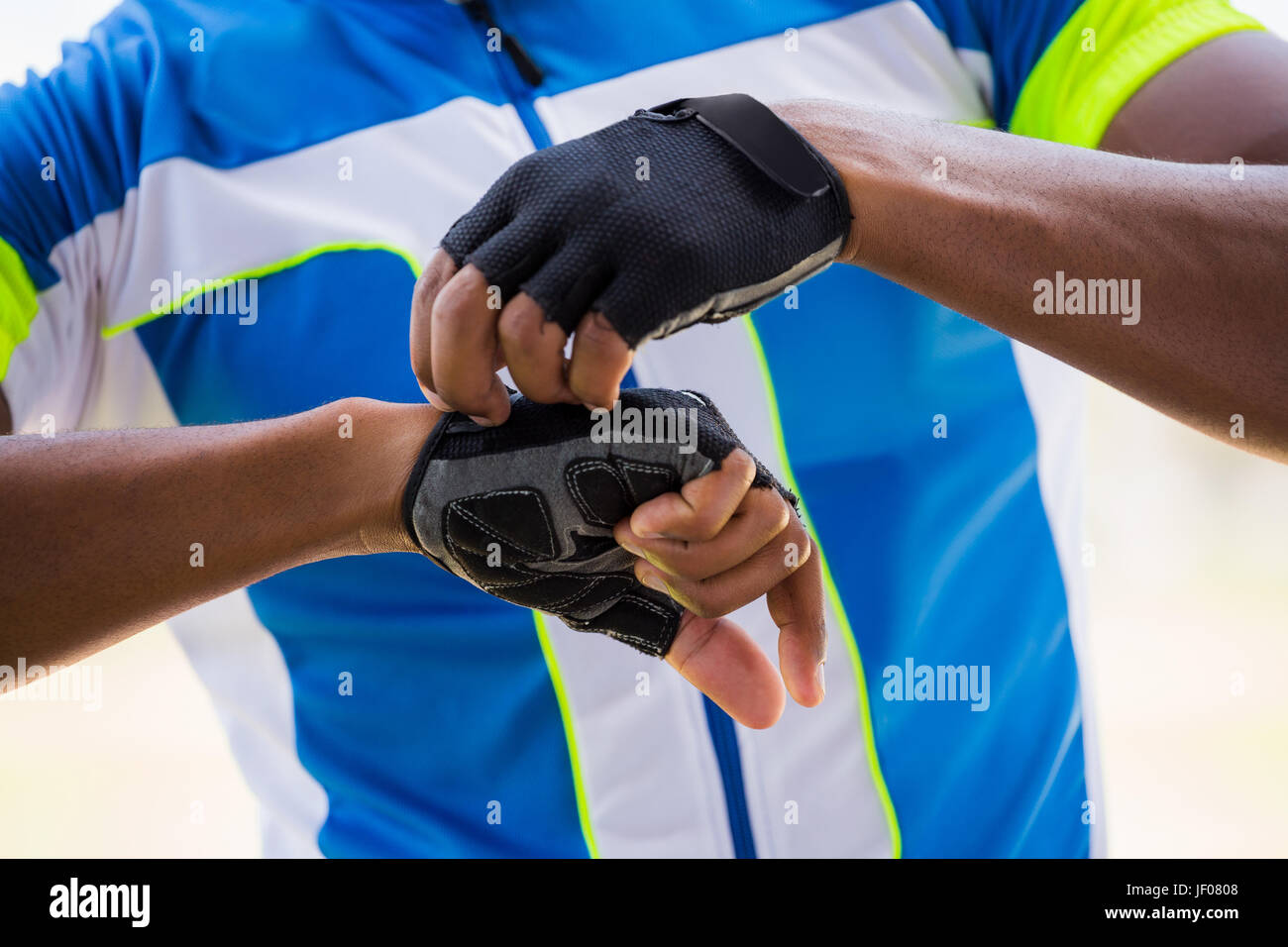 Athlete wearing cycling gloves Stock Photo Alamy