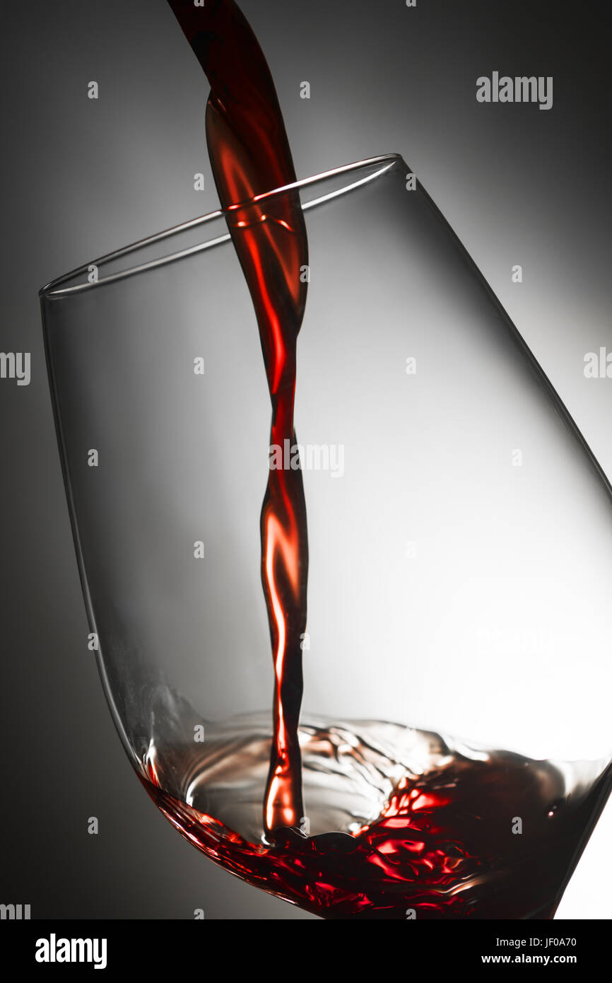 Pour red wine Stock Photo