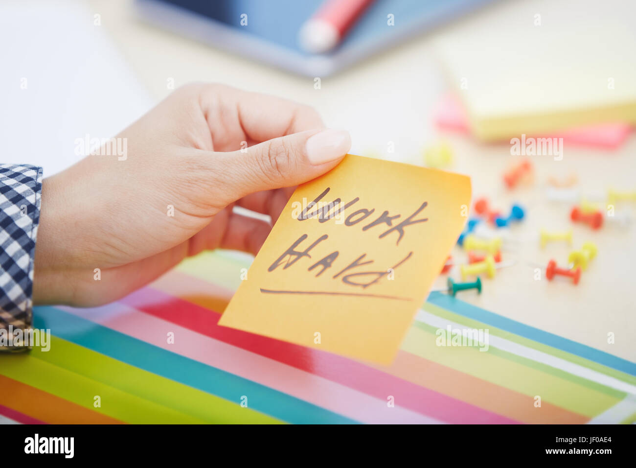 Work hard text on adhesive note Stock Photo - Alamy