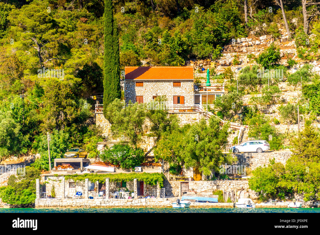 Veliko jezero lake and the surrounding homes on the island of Mljet in Croatia Stock Photo