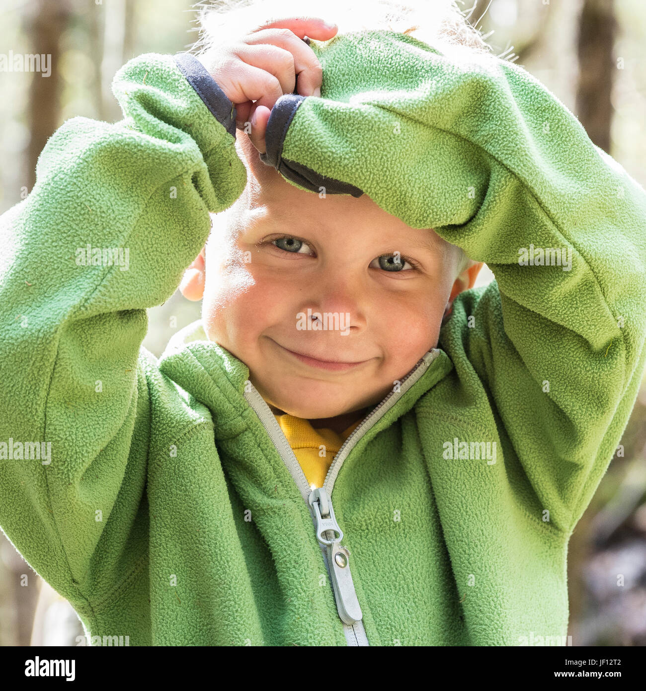 Shy boy smiling camera hi-res stock photography and images - Alamy