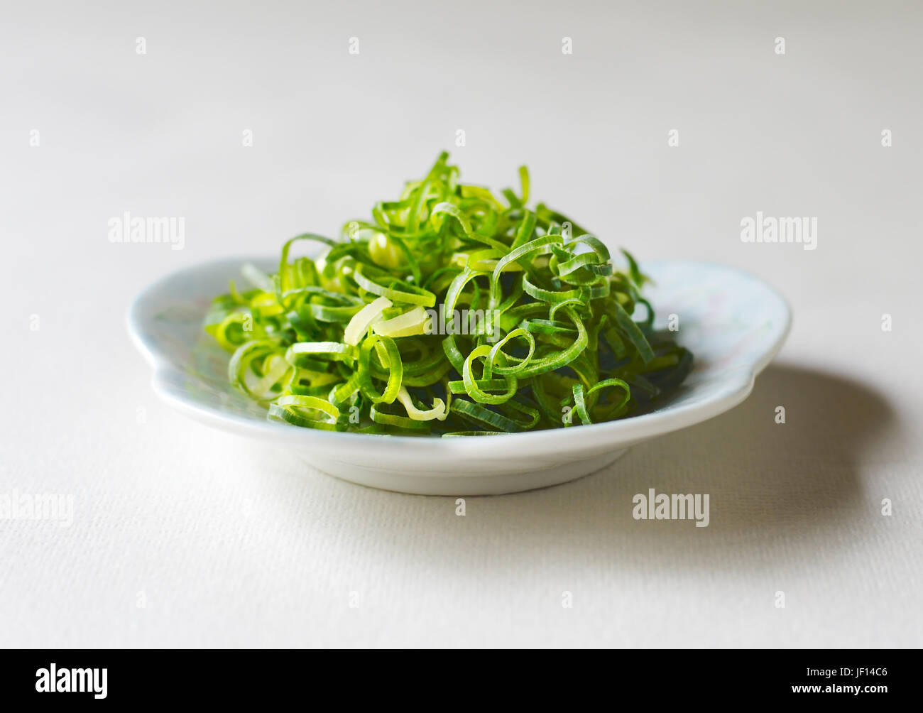 Chopped spring onion white background hi-res stock photography and images -  Alamy