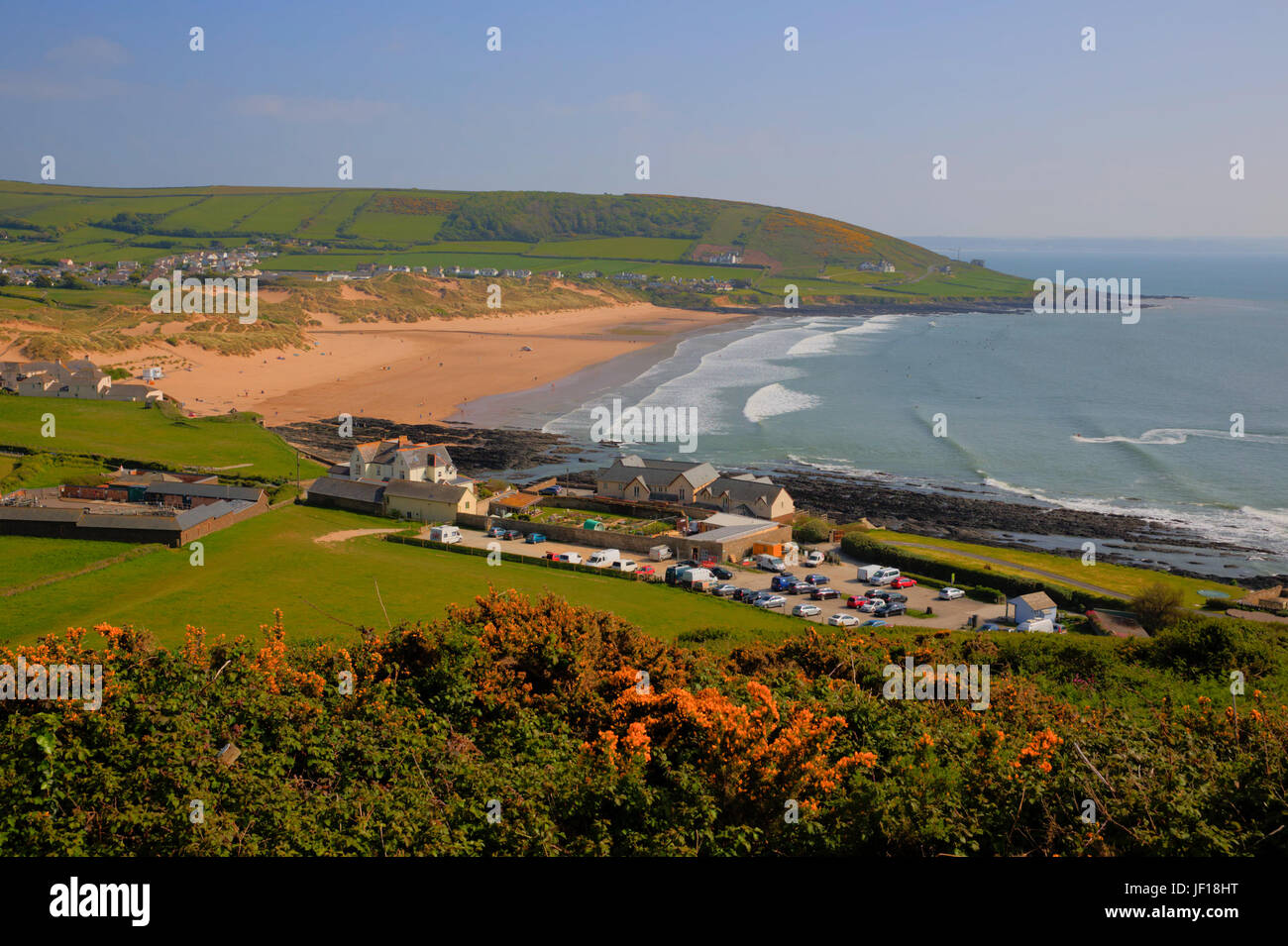 Croyde beach Devon England UK elevated view with orange flowers Stock