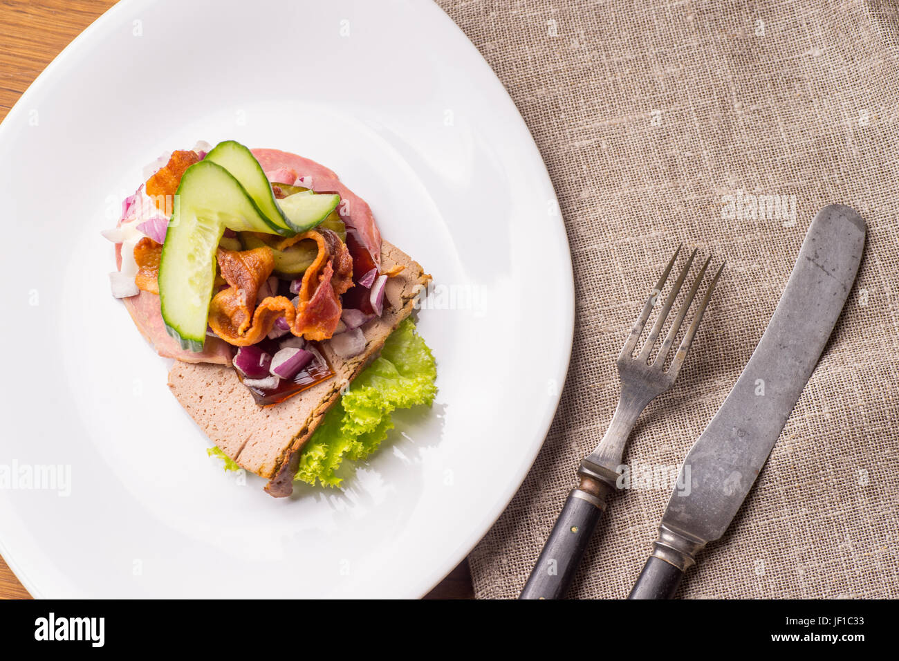 Danish specialties and national dishes, high-quality open sandwich.The very famous piece of butterbread called Veterinarian's midnight snack consistin Stock Photo